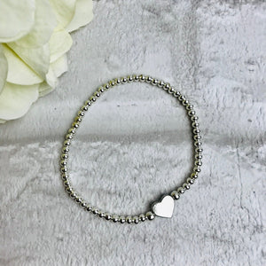 Bracelet. Silver Beads With Heart. Comes Message Card Mounted.