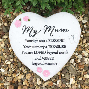 Outdoor Memorial Tribute. Heart Shaped Stone. Pink Flower/Butterfly Mofits. 'My Mum'.