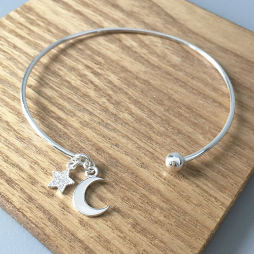 Bangle. Sterling Silver. Moon & Star Charms. Comes in Personalised Gift Box