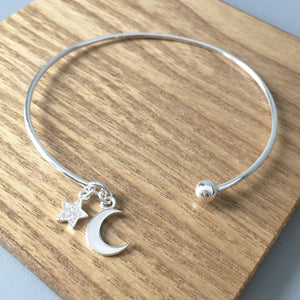 You added Bangle. Sterling Silver. Moon & Star Charms. Personalised Gift Box to your cart.