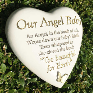 Outdoor Memorial Tribute. White Heart Shaped. Gold Butterfly. 'Our Angel Baby'.