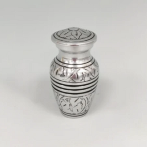You added Token Cremation Urn, Silver Metal With Incised Botanical Pattern to your cart.