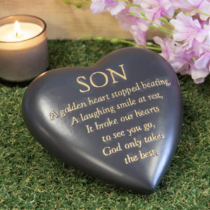 Outdoor Memorial Tribute. Black Heart Shaped Stone. 'Son'.