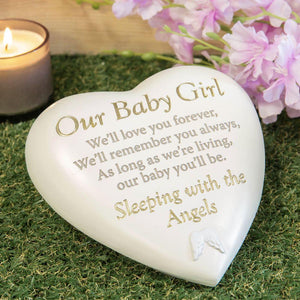 Outdoor Memorial Tribute. White Heart Shaped. Angel Wings Mofit. 'Our Baby Girl'.