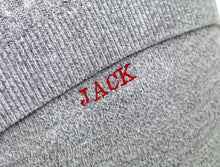 Load image into Gallery viewer, Embroidered name detail on personalised memory cushion.