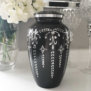 You added Adult Cremation Urn, Black with a Diamond Cut Silver Botanical Pattern to your cart.