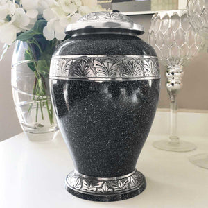You added Adult Cremation Urn, Black With Silver Flecks, Silver Botanical Trim to your cart.