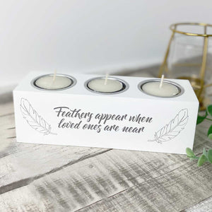 'Feathers Appear' white wooden triple tea light holder